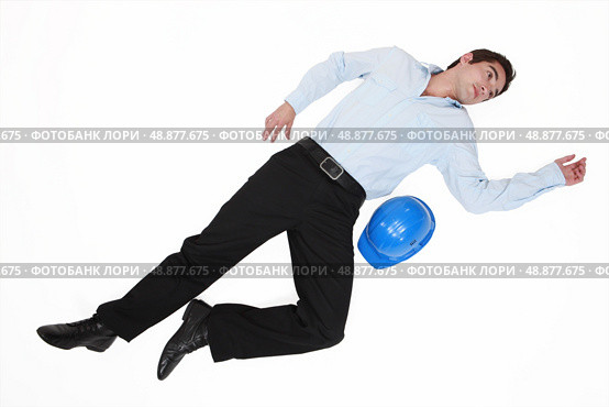Architect pretending to be dead. Стоковое фото, агентство Ingram Publishing / Фотобанк Лори