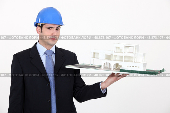 Architect unsure about a design. Стоковое фото, агентство Ingram Publishing / Фотобанк Лори