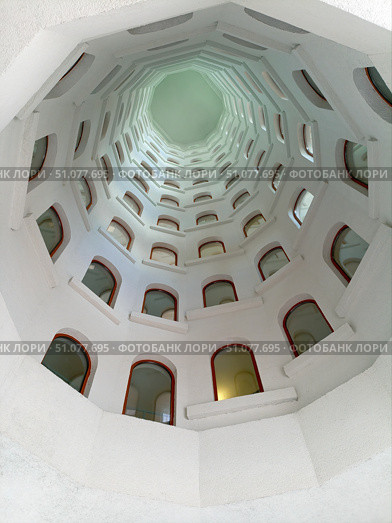Architectural background, spiral staircase with windows opening into a skylight under the dome. Стоковое фото, фотограф Евгений Харитонов / Фотобанк Лори