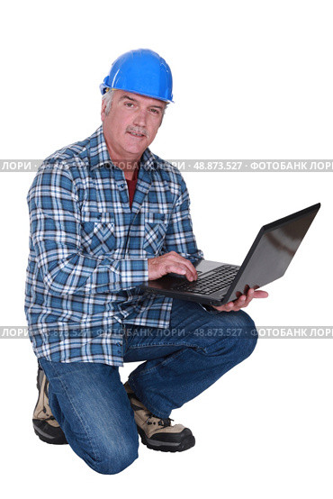 Artisan greater with laptop. Стоковое фото, агентство Ingram Publishing / Фотобанк Лори