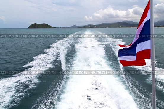 asia myanmar kho samui bay isle waving flag    in thailand and south china sea . Стоковое фото, агентство Ingram Publishing / Фотобанк Лори