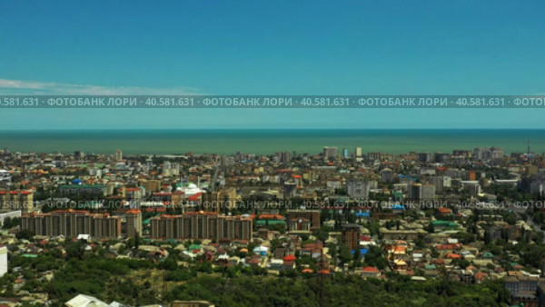 Astrakhan, RUSSIA, 2023. Streets of the city. Aerial shot. Стоковое видео, видеограф Поскребышев Михаил / Фотобанк Лори