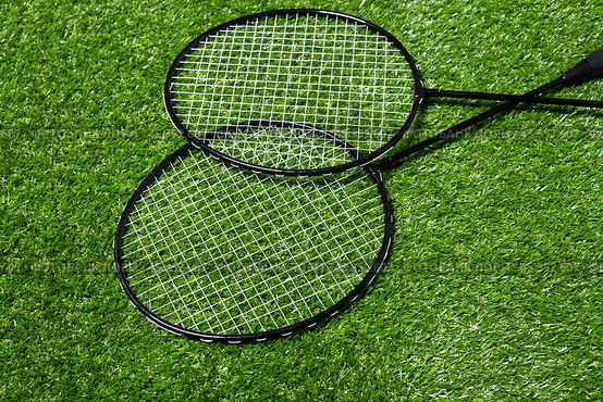 badminton racket on grass. Стоковое фото, фотограф Сергей Толмачёв / Фотобанк Лори