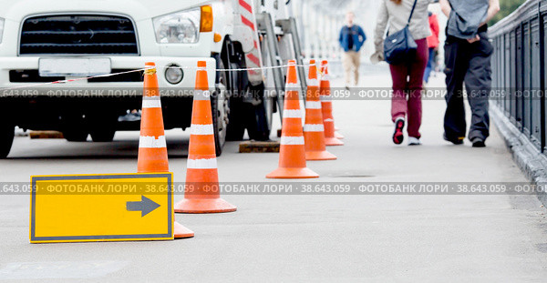Banner. Repair work on the sidewalk in the city on a summer day. Road repairs, tolls and passageways are prohibited, repair work, detour/detour. Стоковое фото, фотограф Photojuli / Фотобанк Лори