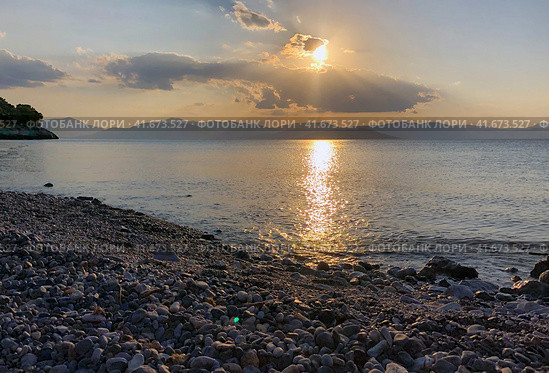 Beautiful sunset at the seaside, Greece. Редакционное фото, фотограф Екатерина Каляева / Фотобанк Лори