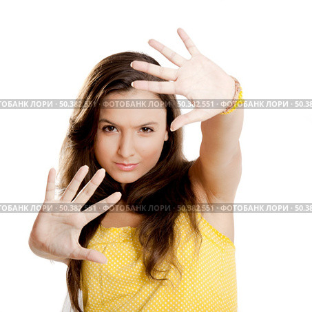 Beautiful young girl with both hands on the air, isolated on white. Стоковое фото, агентство Ingram Publishing / Фотобанк Лори