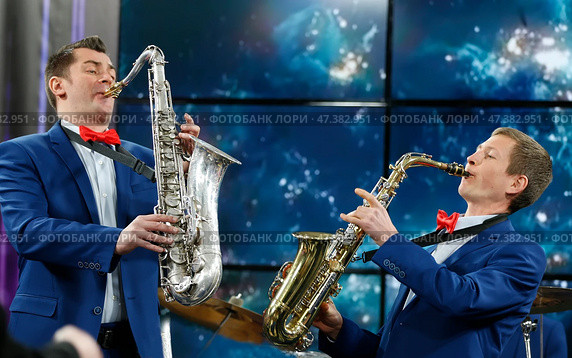 Belarus, Gomel, the performance of the Gomel city orchestra. March 29, 2017.Playing Saxophones.Jazz music. To play in the orchestra. Wind instruments.Musician saxophonist. Редакционное фото, фотограф Лазаренко Светлана / Фотобанк Лори