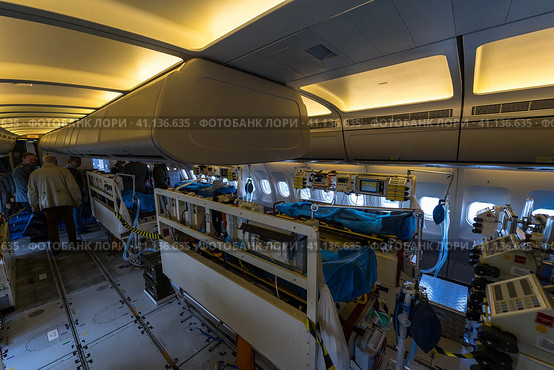 BERLIN, GERMANY - APRIL 25, 2018: Interior of the salon for evacuation and first aid to the wounded of transport Airbus A310-900 MRTT MedEvac "Hermann Kohl". German Air Force. Exhibition ILA Berlin Air Show 2018. Редакционное фото, фотограф Sergey Kohl / Фотобанк Лори