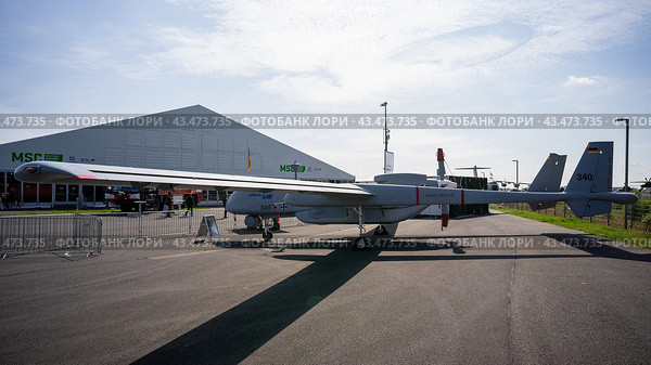 BERLIN - JUNE 06, 2024: The Reconnaissance Medium-altitude long-endurance unmanned aerial vehicle IAI Eitan ("Steadfast"), also known as Heron TP. ILA Berlin Air Show 2024. Редакционное фото, фотограф Sergey Kohl / Фотобанк Лори