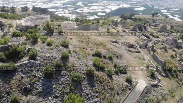 Bird's eye view of Rhodiapolis remains, near Kumluca in Antalya Province, Turkey. Стоковое видео, видеограф Яков Филимонов / Фотобанк Лори