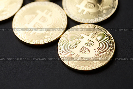 Bitcoin gold coin and chart background. Стоковое фото, фотограф Иван Карпов / Фотобанк Лори