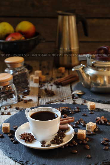 Black coffee with cinnamon, anise and cane sugar. Стоковое фото, фотограф Феликс Хромых / Фотобанк Лори