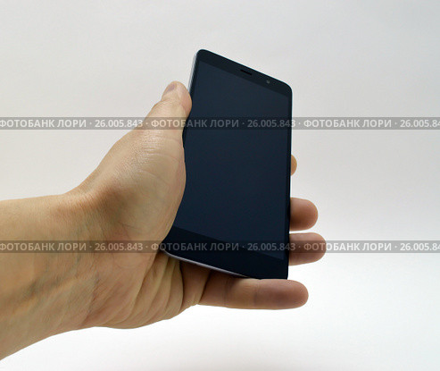Black smartphone in hand. Стоковое фото, фотограф Дмитрий Родин / Фотобанк Лори