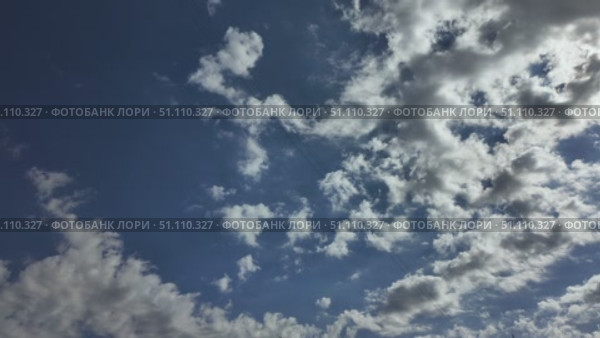 Blue sky white clouds. Puffy fluffy white clouds. Cumulus cloud cloudscape timelapse. Summer blue sky time lapse. Nature weather blue sky. White clouds background. Cloud time lapse. Стоковое видео, видеограф Наталия Попова / Фотобанк Лори
