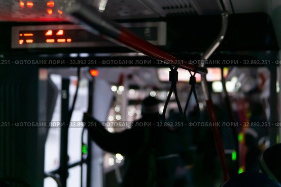 Blurred background with dark interior of public transport. Стоковое фото, фотограф Евгений Харитонов / Фотобанк Лори