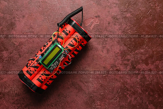 Bomb with timer on color background. Стоковое фото, фотограф Pixel_shot / Фотобанк Лори