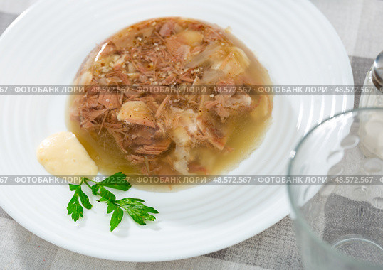 Bowl of homemade pork aspic, meat jelly. Стоковое фото, фотограф Яков Филимонов / Фотобанк Лори