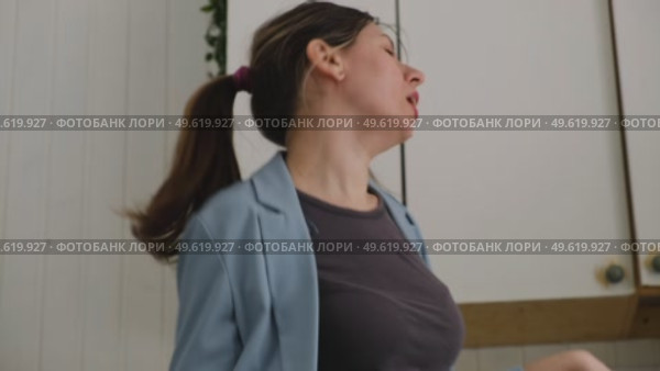 Brunette woman dance, have fun at home listens song, moves to music, feels overjoyed, celebrate good news, relish carefree life looks happy. Young adult female twirls, grooves. Lady dancing in kitchen. Стоковое видео, видеограф Марина Демидюк / Фотобанк Лори