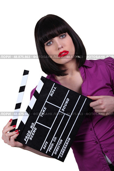 Brunette woman with a slate. Стоковое фото, агентство Ingram Publishing / Фотобанк Лори