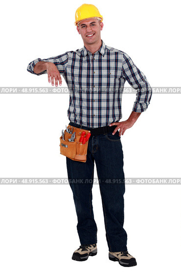 Builder leaning on invisible item. Стоковое фото, агентство Ingram Publishing / Фотобанк Лори