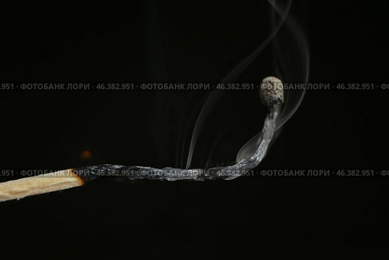 Burnt match with fume on black background. Emotional burnout concept. Стоковое фото, фотограф Pixel_shot / Фотобанк Лори