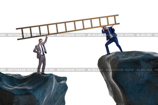 Business people helping to go over chasm. Стоковое фото, фотограф Elnur / Фотобанк Лори