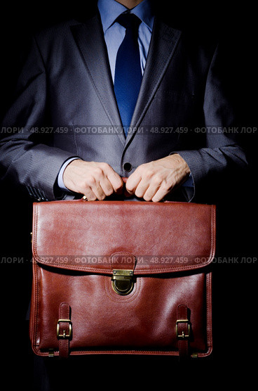 Business spy with briefcase. Стоковое фото, агентство Ingram Publishing / Фотобанк Лори