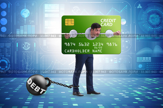 Businessman in credit card burden concept in pillory. Стоковое фото, фотограф Elnur / Фотобанк Лори