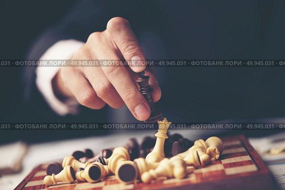 Businessman play with chess game. concept of business strategy and tactic. Стоковое фото, агентство Ingram Publishing / Фотобанк Лори