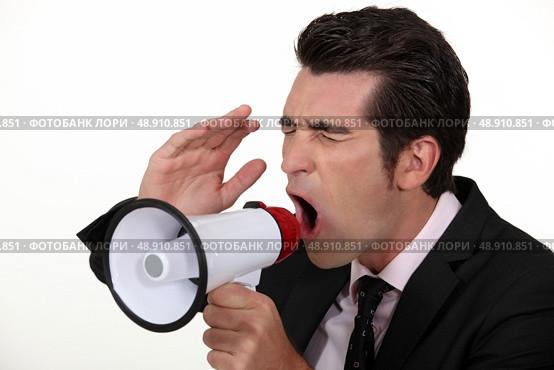 Businessman with a loudhailer. Стоковое фото, агентство Ingram Publishing / Фотобанк Лори