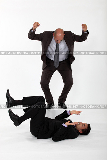 Businessmen having a fight. Стоковое фото, агентство Ingram Publishing / Фотобанк Лори