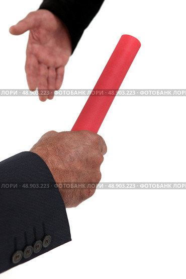 Businessmen passing the baton. Стоковое фото, агентство Ingram Publishing / Фотобанк Лори