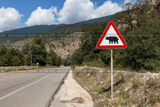 Caution bear sign along Gorgan Bojnord road in Golestan National Park. Стоковое фото, фотограф Михаил Пряхин / Фотобанк Лори