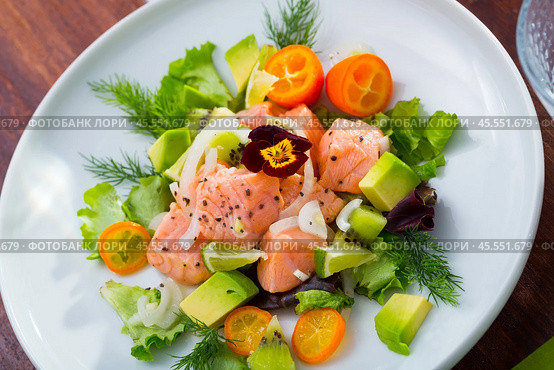 Ceviche from salmon on plate with cumquat, green dill and avocado. Стоковое фото, фотограф Яков Филимонов / Фотобанк Лори