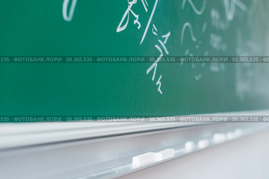 chalkboard with written mathematical formulas. Стоковое фото, агентство Ingram Publishing / Фотобанк Лори