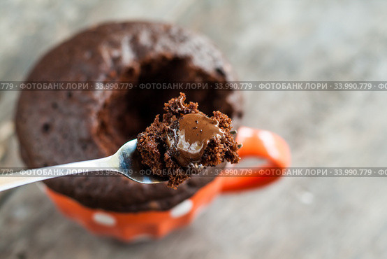 Chocolate pie in a cup filled with a liquid. Стоковое фото, фотограф Tetiana Chugunova / Фотобанк Лори