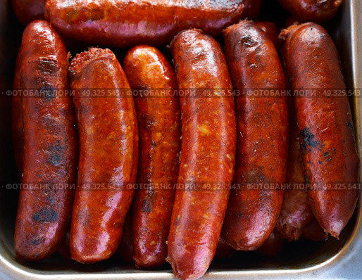 Chorizo sausage barbecue cooked in Mexico. Стоковое фото, агентство Ingram Publishing / Фотобанк Лори
