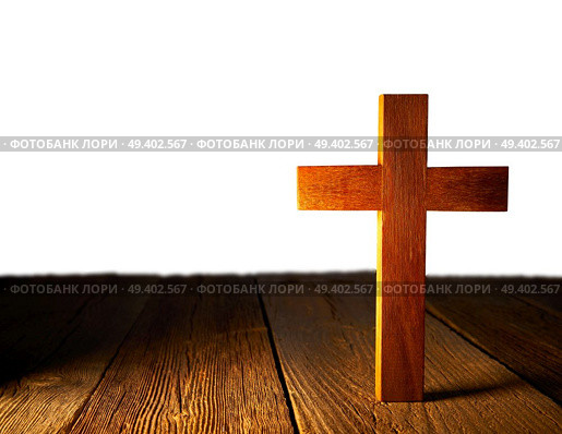 Christian wood cross on white and wooden background. Стоковое фото, агентство Ingram Publishing / Фотобанк Лори