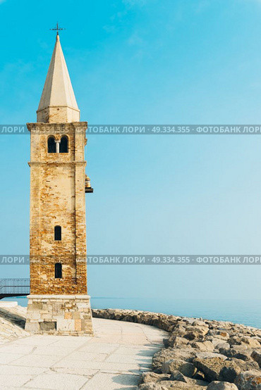 Church of Our Lady of the Angel on the beach of Caorle Italy, Santuario della Madonna dell’Angelo. Стоковое фото, агентство Ingram Publishing / Фотобанк Лори
