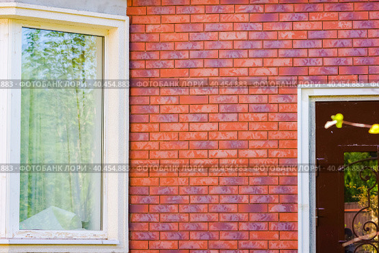 Clinker thermal panels for finishing the facade of the house. Стоковое фото, фотограф Юрий Поздников / Фотобанк Лори