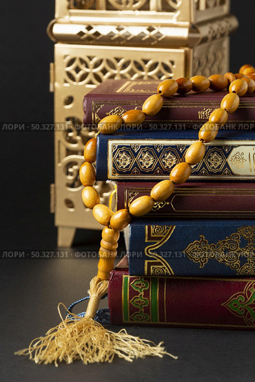 close up islamic new year with quran books. High resolution photo. close up islamic new year with quran books. High quality photo. Стоковое фото, агентство Ingram Publishing / Фотобанк Лори