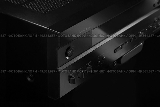 Close up of a stereo receiver/amplifier. Audio&video control center. Стоковое фото, агентство Ingram Publishing / Фотобанк Лори
