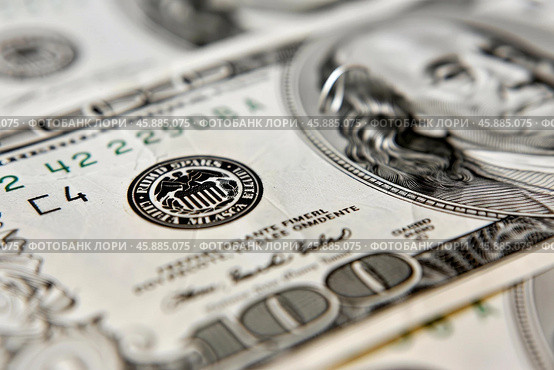 Close up of one hundred dollar bill showing seal and portrait of benjamin franklin. Стоковое AI-изображение, AI-художник Иван Рябоконь / Фотобанк Лори