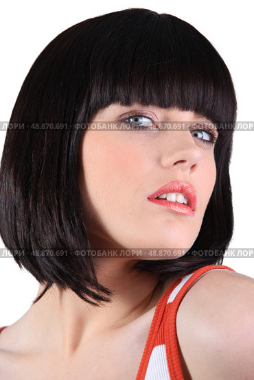 close-up portrait of glamorous blue-eyed brunette with fringe. Стоковое фото, агентство Ingram Publishing / Фотобанк Лори