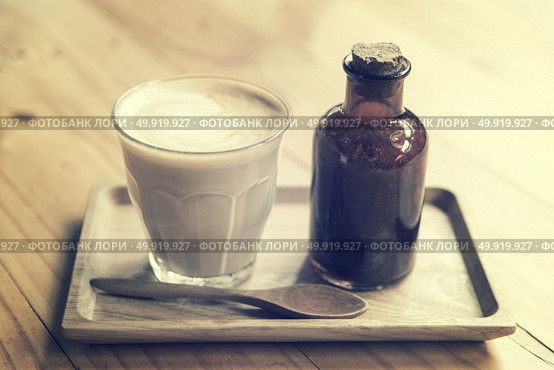 coffee latte art with sugar, vintage filter image. Стоковое фото, агентство Ingram Publishing / Фотобанк Лори