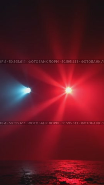 Colorful beaming led lights with white and red glow in darkness. Fog or mist lays on ground for creepy or scary mood. Concept danger or evacuation signs in futuristic movie style. Стоковое AI-видео, аниматор Sergey Grishin / Фотобанк Лори