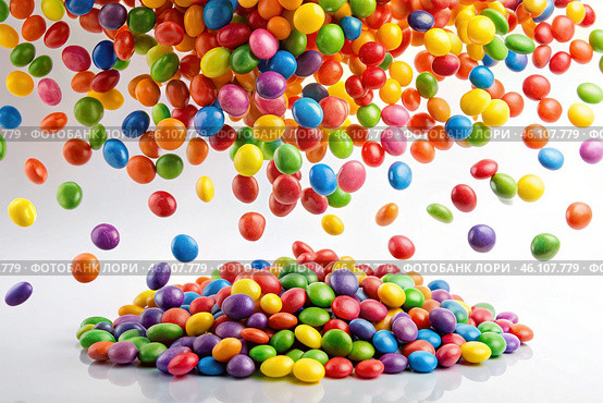 Colorful dragee candies in the assortment on a white background. Various sweets, confectionery and dragees of different shapes and colors. Bright rainbow hues. Стоковое AI-изображение, AI-художник Photojuli / Фотобанк Лори