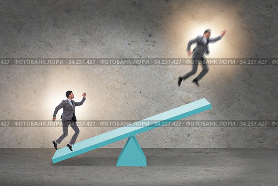 Competition concept with businessman and seesaw. Стоковое фото, фотограф Elnur / Фотобанк Лори