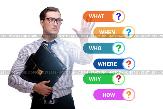 Concept of many different questions asked with businessman. Стоковое фото, фотограф Elnur / Фотобанк Лори