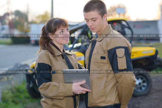 concept of rally driving team. Стоковое фото, агентство Ingram Publishing / Фотобанк Лори